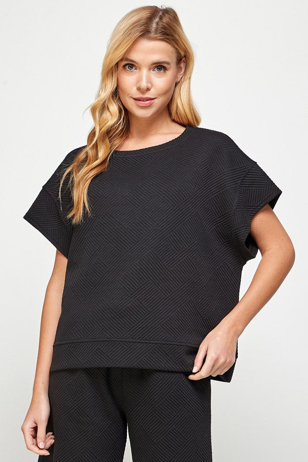 See and Be Seen Luxe Travel Top- Black, short sleeves, rounded neck, textured, curvy