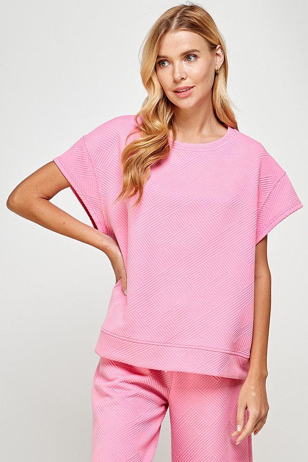 See and Be Seen Luxe Travel Top- Bubble gum, short sleeves, rounded neck, textured, curvy
