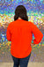 Entro Everyday Top - Sunset. plus, red, orange, tomato, airflow, long sleeve, v-neck, wear to work